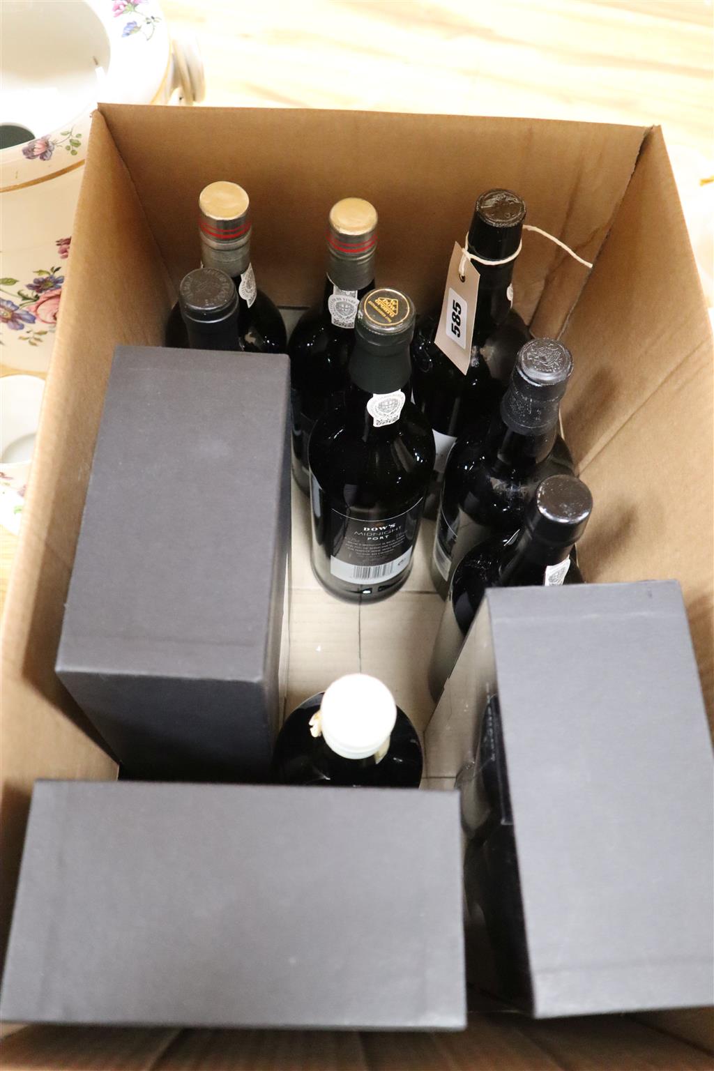 Eleven bottles of non-vintage port; four Grahams 19998/9, five Dows Sandeman and Taylors.